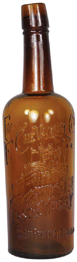 The F Chevallier Co's Amber Whiskey Bottle: The F Chevallier Co's Embossed Amber Whiskey BottlE Castle Whiskey, San Francisco. No chips or cracks. 11 1/2 inches tall.