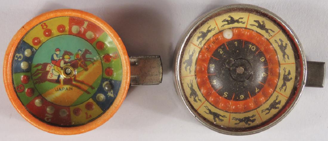 Two Pocket Horse Race Gambling Games: Two Pocket Horse Race Gambling Games. One marked Japan the other Foreign. 1 7/8 inch diameter.