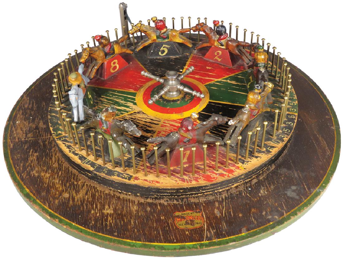 Horse Race Gambling Wheel Casino Table Game: Horse Race Gambling Wheel Casino / Carnival Table GamE Mason & Co. NY. Wood base and racing surface with cast metal painted horses. Nickel plated brass pins and clicker. 18 inch diameter.