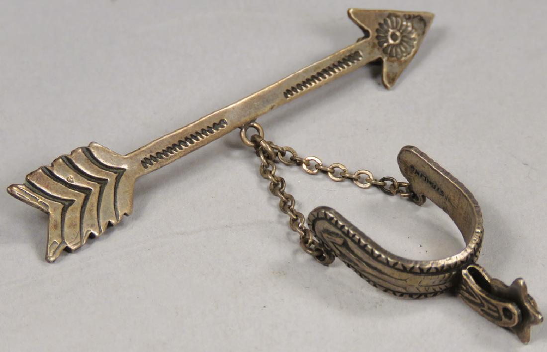 Vintage Sterling Silver Arrow and Spur Pin: Vintage Sterling Silver Arrow and Spur Pin. Beautiful engraved detail, stamped Sterling. Arrow measures 2 3/8 inches.