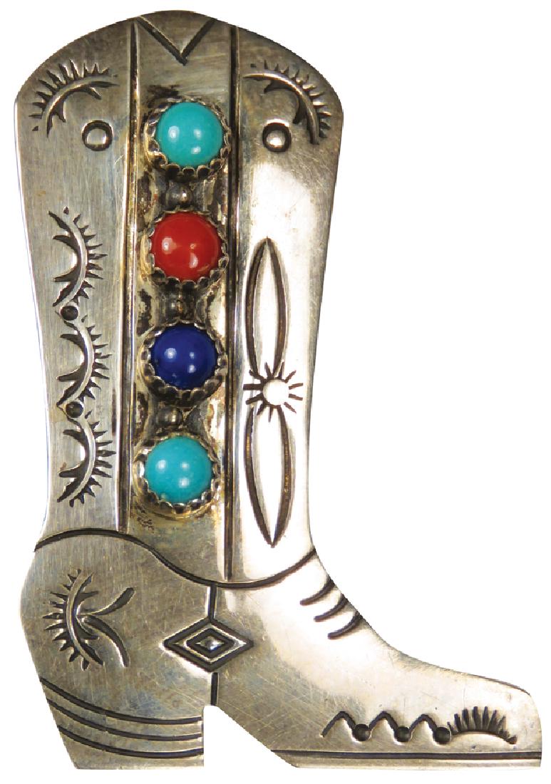 Vintage Sterling Silver Cowboy Boot Pin: Vintage Sterling Silver Cowboy Boot Pin. Accented with lapis, coral and turquoise. Stamped Sterling. 1 1/8 X 1 3/4 inches.
