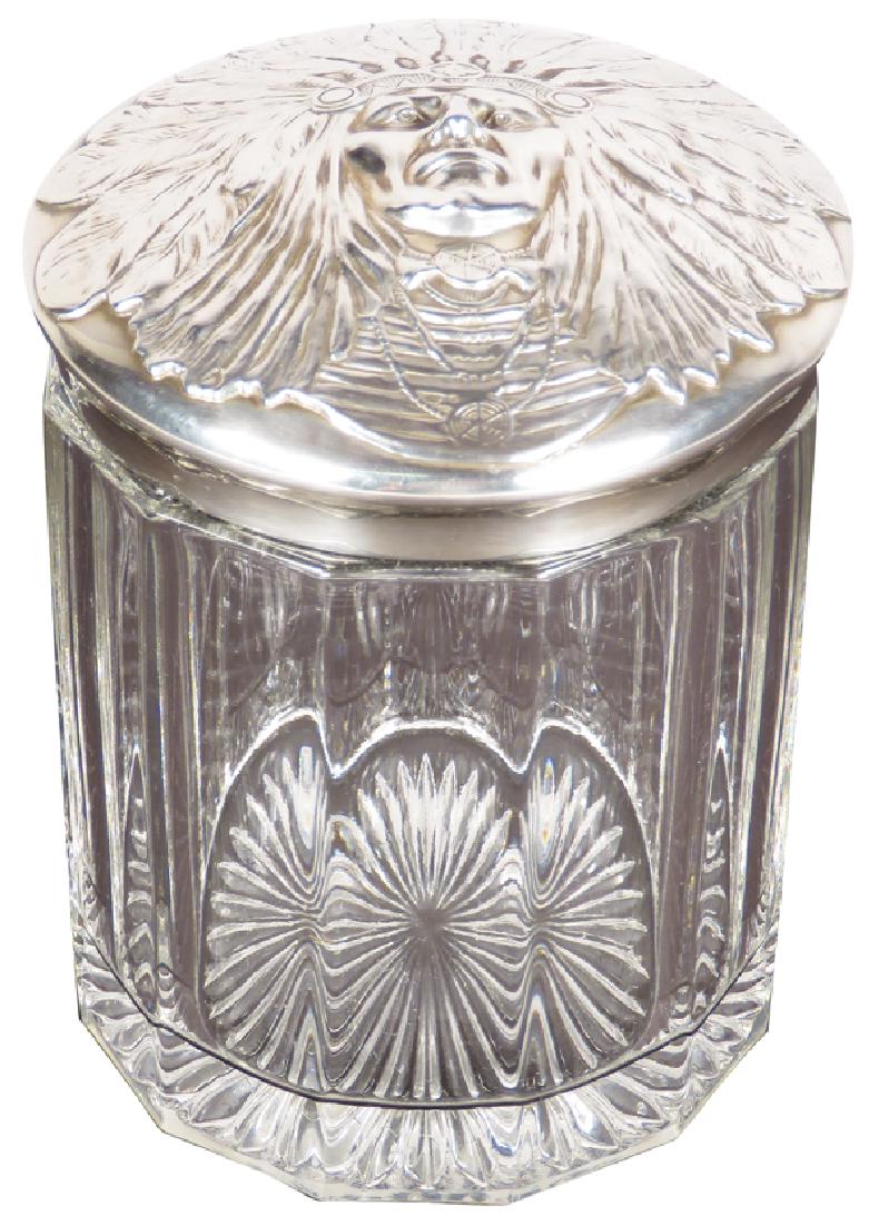 Antique Apollo Silver Co. Lead Crystal Humidor: Antique Apollo Silver Co. Lead Crystal Humidor. Silver lid with "Unger" Indian on lid. 5 1/2 inches tall X 3 3/4 inch diameter.
