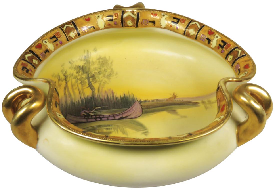 Nippon Hand Painted Porcelain Dish: Nippon Hand Painted Porcelain Dish. Pinched edges with handles. Native Indian in canoe motif. No chips or cracks. 7 1/2 inch diameter X 2 1/2 inches tall.