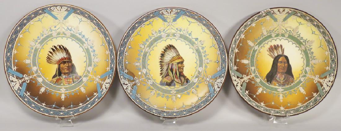Three Hand Painted Nippon Plates: Three Hand Painted Nippon Plates with Native American Motif. Plate with bear tooth necklace has chip at 12:00 otherwise no other chips on cracks. 10 inch diameter.
