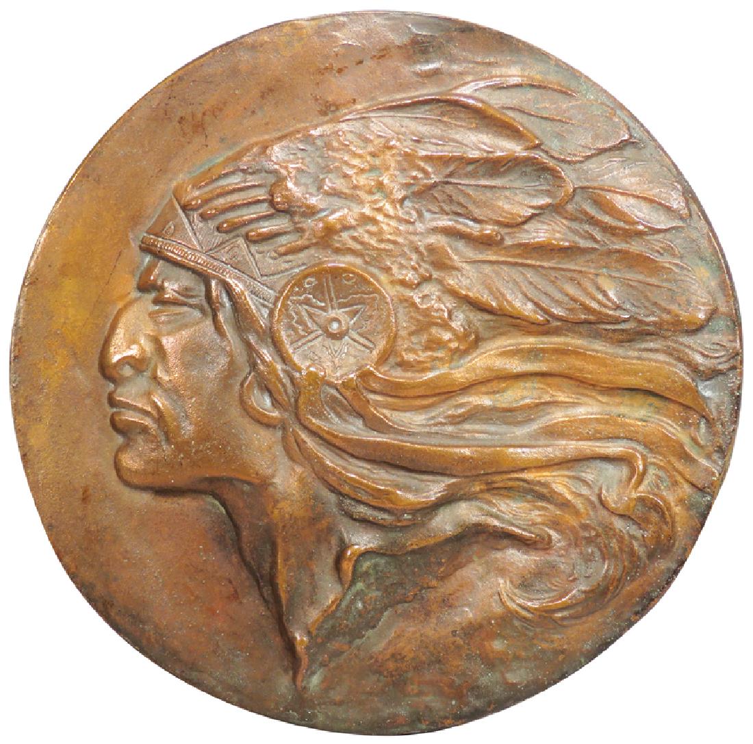 Native Indian Embossed Wall Plaque: Native Indian Embossed Wall Plaque. Copper flashed brass. 9 inch diameter.