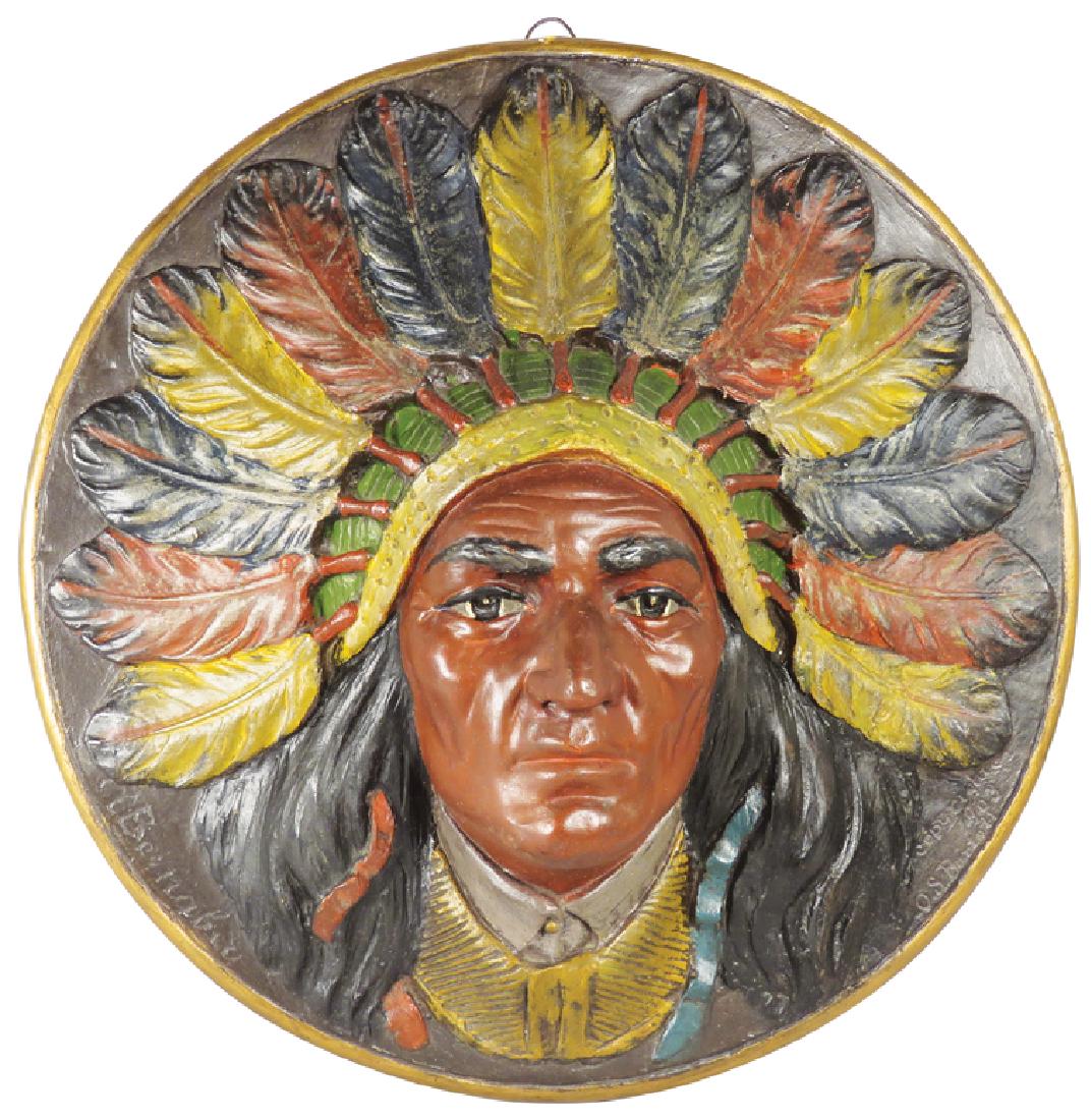 Native American High Relief Embossed Plaque: Early Native American High Relief Plaster Plaque. Copyright 1903 O.S. Bartell, artist A. Bernaheo. Hand painted, has been repaired on right at 3:00. 17 1/2 inch diameter.