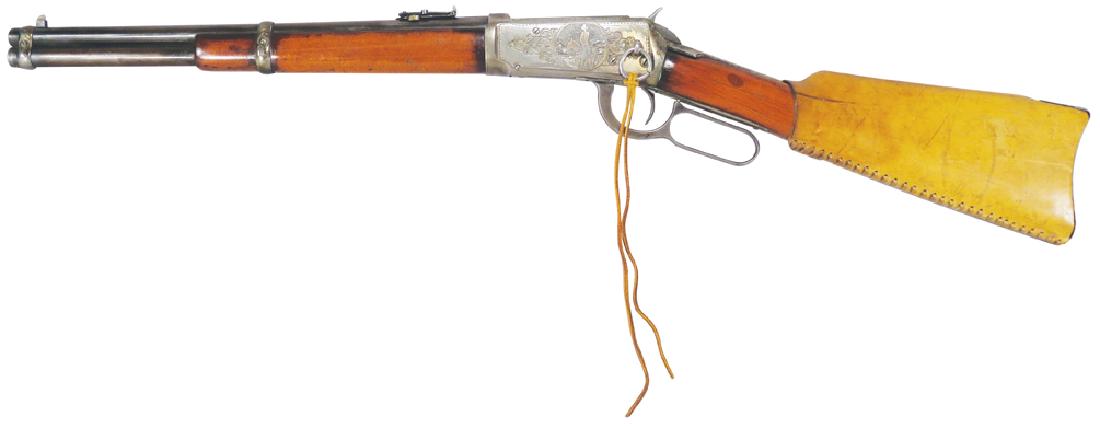 Very Rare Winchester Model 1894 "Deer Slayer" Rifle: Very Rare Winchester Model 1894 "Deer Slayer" Rifle. Made in 1913, 25/35 gauge trapper's model, serial # 660409. Factory engraved with leather covered stock. Excellent original condition. This gun wil