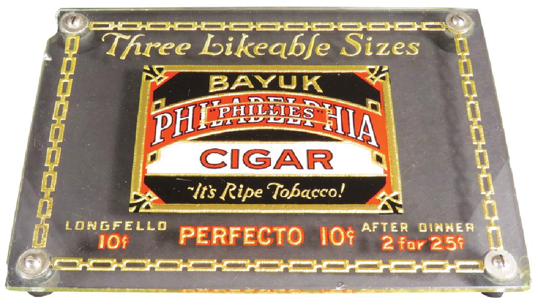 Phillies Cigars Glass Counter Top Advertising Tray: Phillies Cigars Glass Counter Top Advertising Tray. Reverse etched glass design. Chipped Corner otherwise Excellent condition. 11 X 8 X 1 inches.