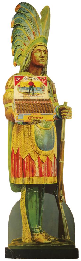 Cremo Cigars Die Cut Cardboard Store Display: Cremo Cigars Die Cut Cardboard Store Display. Depicting cigar store Indian. Repaired tear on hand, staining and creases at bottom left corner. 16 X 59 1/2 inches.