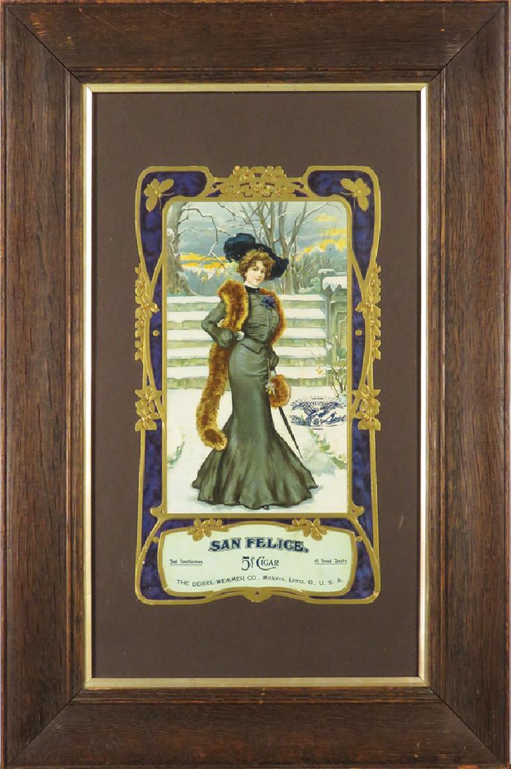 San Felice Cigars Die Cut Cardboard Sign: San Felice Cigars Die Cut Cardboard Sign. The Deisel-Wemmer Co. Makers. Lima, O. Beautiful woman with snow scene. Minor edgewear otherwise very good condition, framed under glass. 7 1/2 X 13 1/2 inche