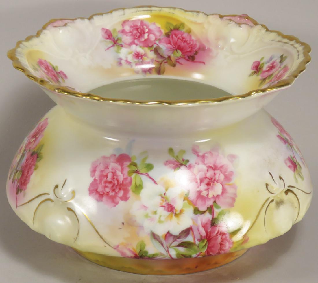 Antique Royal Schwarzburg China Spittoon: Antique Royal Schwarzburg China Spittoon. Pink and white carnation motif. Embossed with scalloped edges. No chips or cracks. 8 inch diameter X 5 1/2 inches tall.