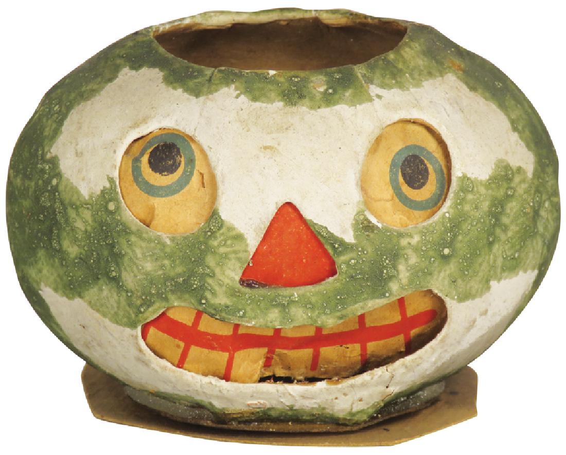 Jack O Lantern German Vintage Halloween Lantern: Jack O Lantern German Vintage Halloween Lantern. Original insert made during 20's/30's. Original wire bale and wire candle clip inside, pressed cardboard. 3 1/2 X 3 1/2 X 3 inches.