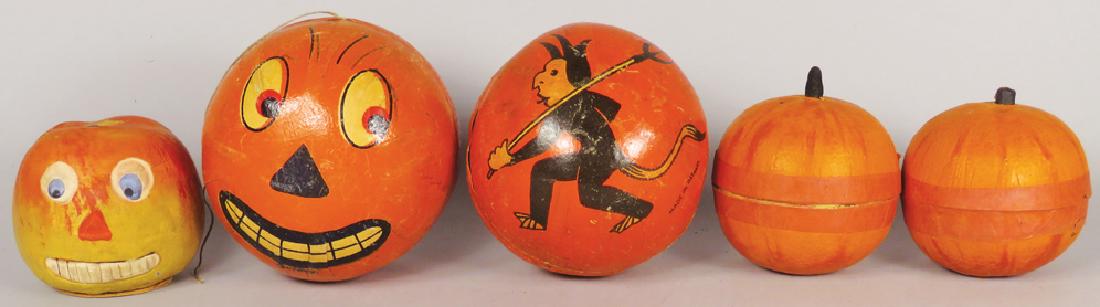 Collection of Vintage Halloween Noise Makers: Collection of Vintage Halloween Noise Makers/Rattles and Candy Container. Container is composition in the shape of an apple. Container with bottom plug measures 2 inches tall.
