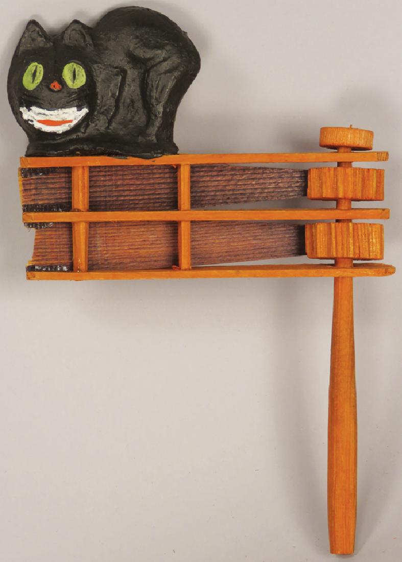 Two Vintage Halloween Wood Ratchet Noisemakers: Two Vintage German Halloween Wood Ratchet Noisemakers. Composite black cat and pumpkin head. Excellent overall condition.