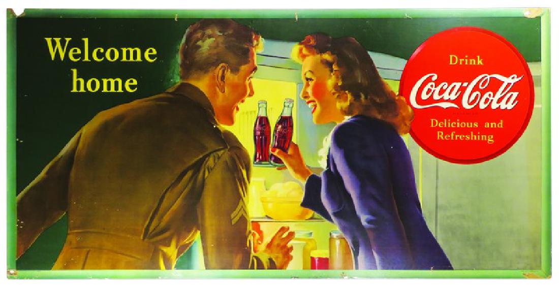 1944 Coca Cola Cardboard Sign: 1944 Coca Cola Cardboard Sign. Depicting couple reaching in refrigerator for a Coke, "Welcome home" to man in uniform. Holes and paper loss around perimeter. 56 1/2 X 27 1/4 inches.
