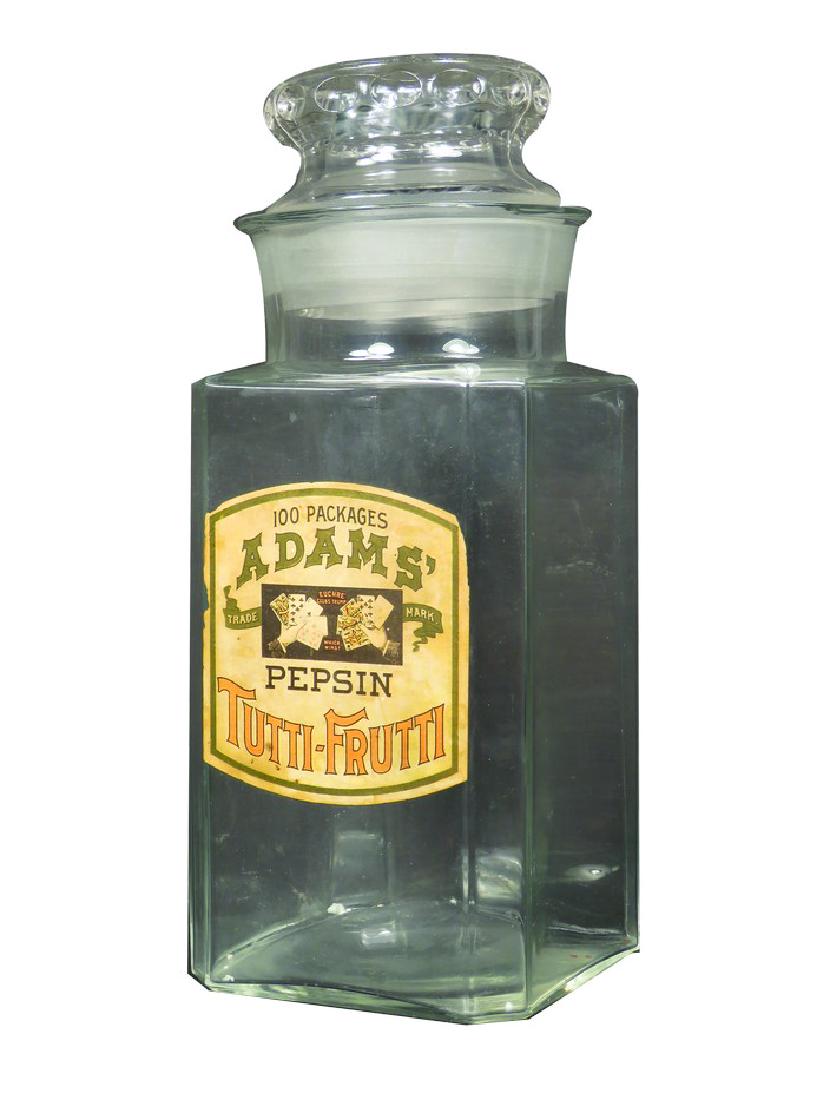 Adam's Pepsin Tutti-Frutti Gum Jar: Adam's Pepsin Tutti-Frutti Gum Jar. Original "Euchre motif" paper label with ground glass rim and lid. Couple minor chips interior of lid. 4 1/2 X 11 1/4 X 4 1/2 inches.