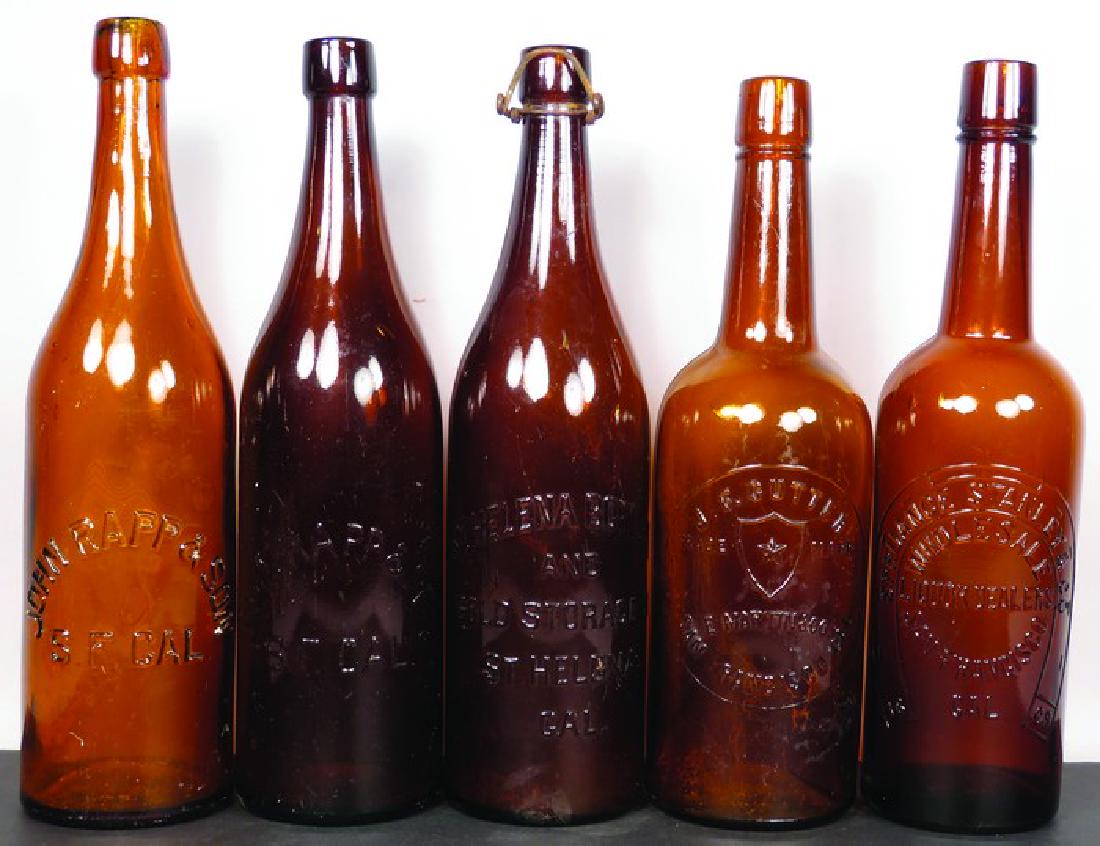 Collection of Embossed Amber Liquor Bottles