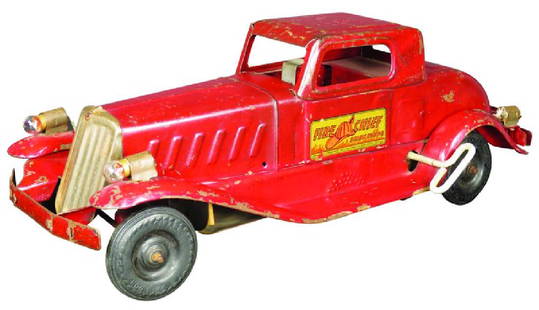 Girard Model Works Steel "Fire Chief" Toy Car: Girard Model Works Pressed Steel "Fire Chief" Friction Propelled Toy Car, Girard, PA. Normal playwear. 14 1/2 inches long.