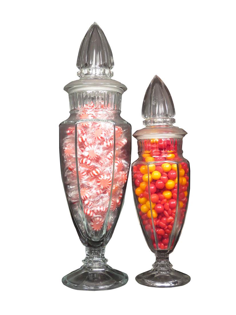 Pair of Congress Cylinder Candy Jars: Pair of Congress Cylinder Candy Jars with ground glass rims and lids. Very fine chips on lips of lids otherwise excellent overall condition. 17 3/4 and 14 inches tall.