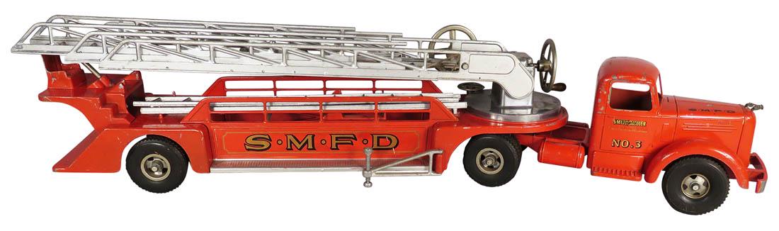 Smith Miller Pressed Steel Toy Fire Ladder Truck: Smith Miller Pressed Steel Toy Fire Ladder Truck, ca. 1950. No. 3 Hook and Ladder Mach Truck. Front bumper broken on driver side otherwise very good original condition. 35 inches long.