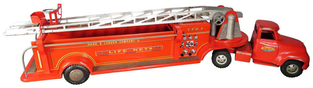 Tonka Pressed Steel Toy Extension Ladder Truck: Tonka Pressed Steel Toy Extension Ladder Fire Truck. Hook and Ladder Co. No. 9. Headlights missing otherwise good original condition. 33 inches long.