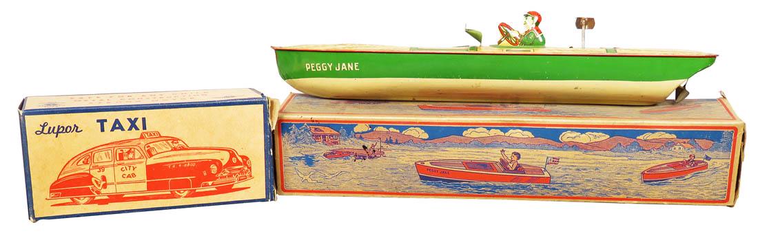 J. Chein "Peggy Jane" Tin Mechanical Motor Boat Toy: J. Chein "Peggy Jane" Tin Mechanical Motor Boat Toy No. 126, in original box. Lupor Tax original box only. Overall very good condition. Boat measures 14 1/2 inches long.