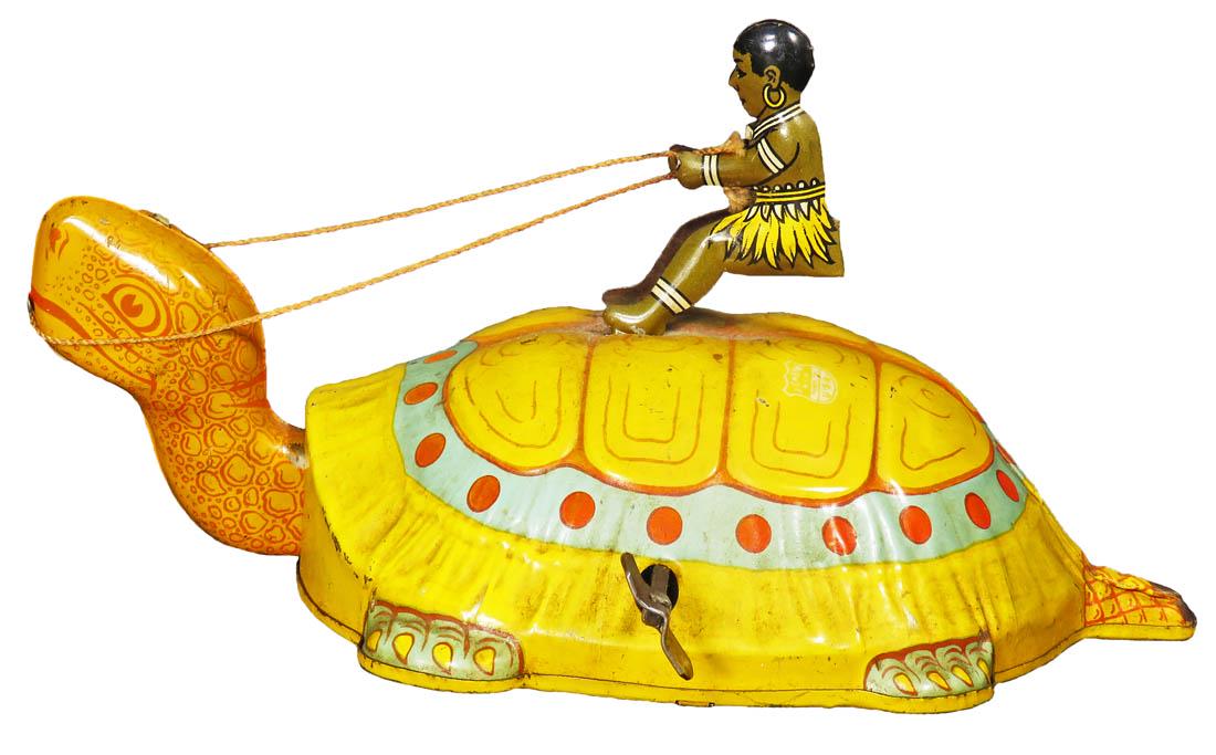 J. Chein Turtle with Native Rider Tin Wind Up Toy: J. Chein Turtle with Native Rider Tin Wind Up Toy, ca. 1930's. Good working condition. 7 1/2 inches long.