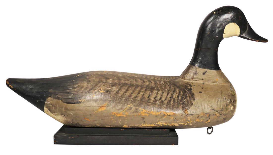 Canada Goose Vintage Wood Decoy: Canada Goose Vintage Wood Decoy on wood platform. Havre de Grace, U.S. Army, Madison Mitchel/Paul Gibson. 22 inches long X 11 1/2 inches tall.