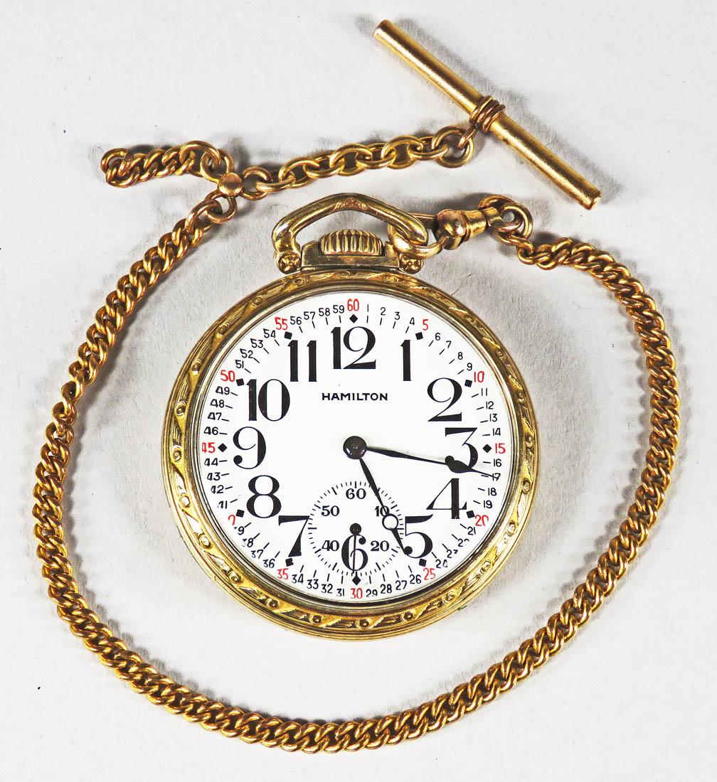 Hamilton Pocket Watch: Hamilton Pocket Watch, ca. 1929. Comes with watch chain. Hamilton Watch Co. Lancaster, PA. 10kt gold filled. 21 jewels, 16 size. Lever set, gold center wheel. Double roller railroad grade dial. Gold j