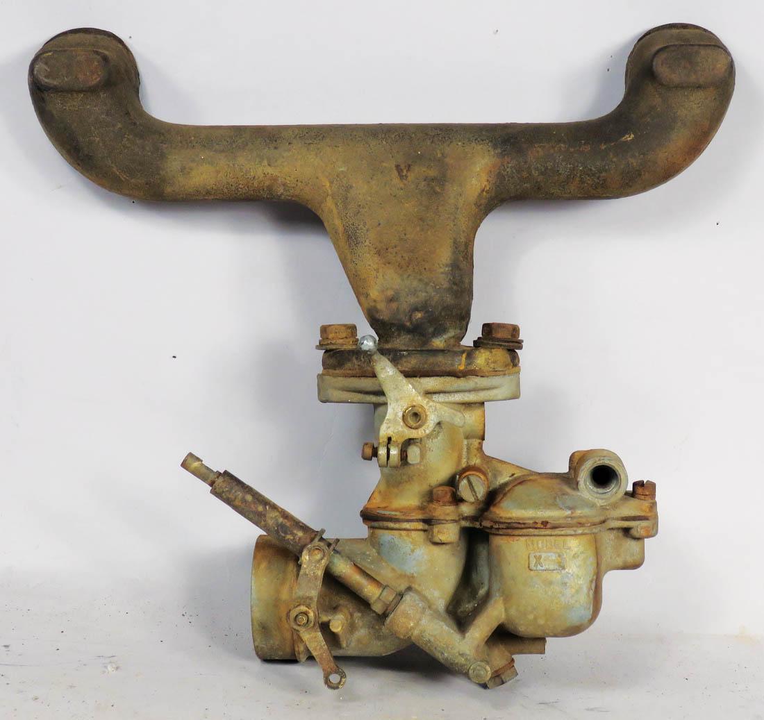 Model T Parts, Tillotson Carburator and Manifold: Model T Parts, Tillotson Model X Carburator and Intake Manifold. Sold as is.