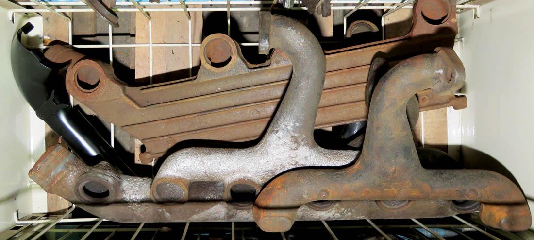 Model T Parts, Intake and Exhaust Manifolds: Model T Parts, Intake and Exhaust Manifolds. Sold as is.