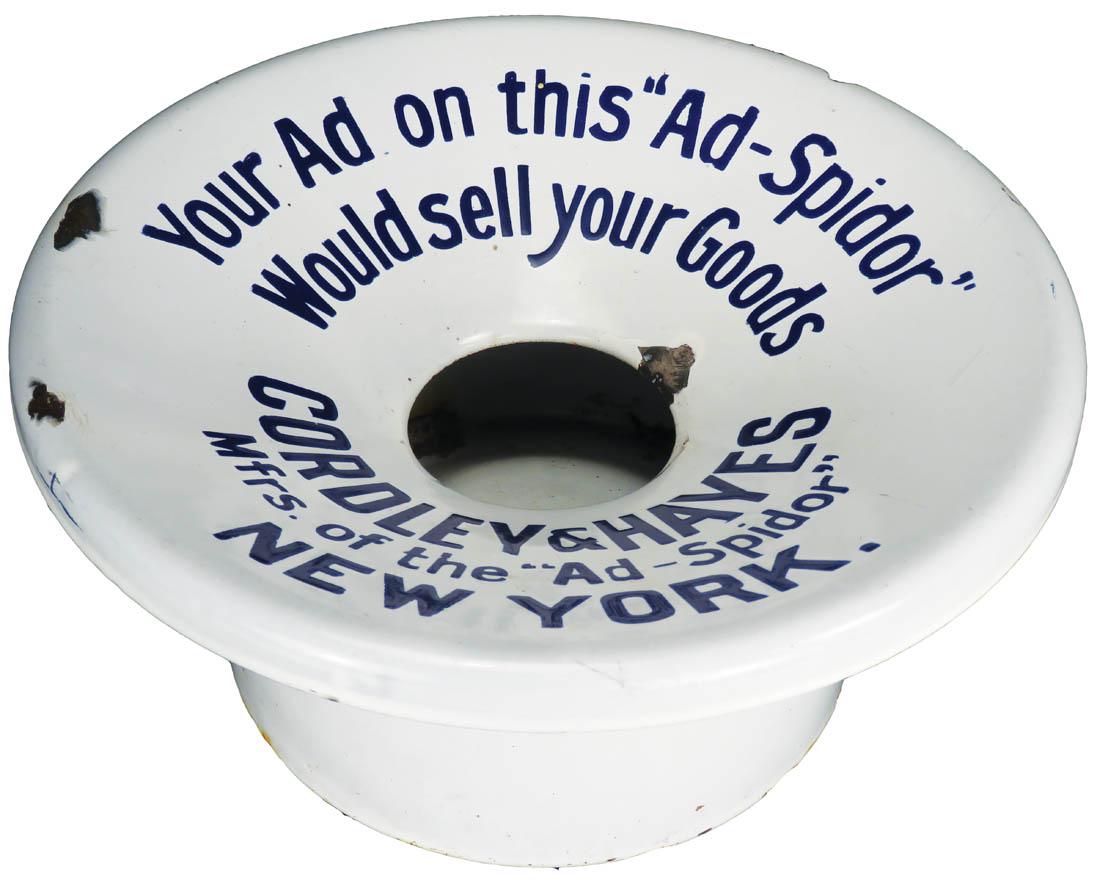 Porcelain Advertising Spittoon: Porcelain Advertising Spittoon. "Ad-Spidor" mfg. by Cordley & Hayes, New York. A couple of chips and edgewear. Top and bottom are a marriage, small bottom not original to top. Top measures 11 inch dia