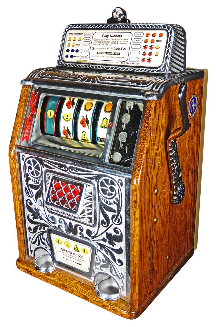 Caille Bros. 5 Cent Grand Prize Bell Slot Machine: Caille Bros. 5 Cent Grand Prize Jackpot Bell Slot Machine, ca. 1930. Serial # 51120. 4 reel, nickel front with oak case. Working condition, comes with key.