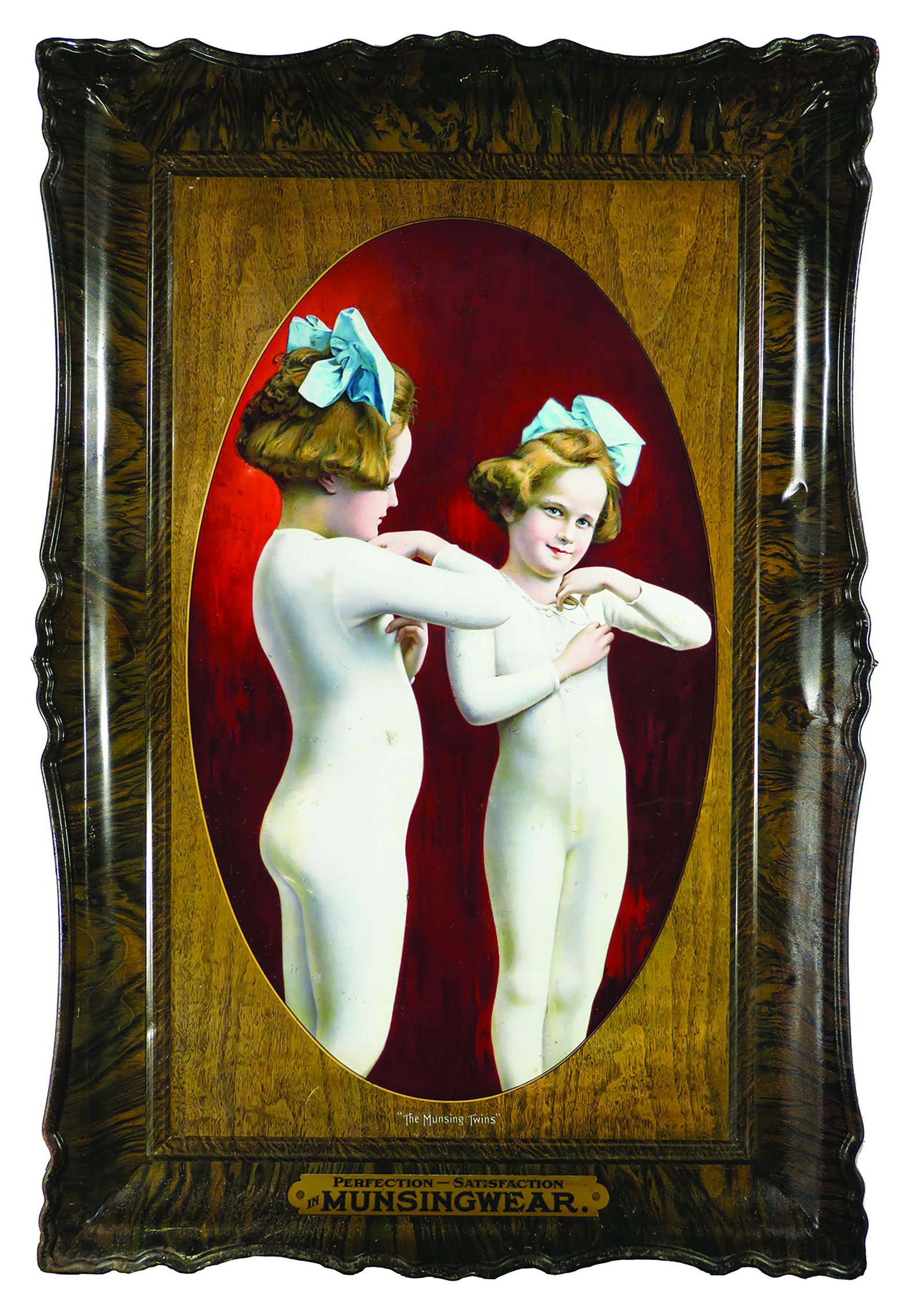 Munsingwear Self Framed Tin Advertising Sign: Munsingwear, Self Framed, Tin Advertising Sign. Depicting "The Munsingwear Twins". A few dents and creases otherwise good condition. 25 1/2 X 37 1/2 inches overall.
