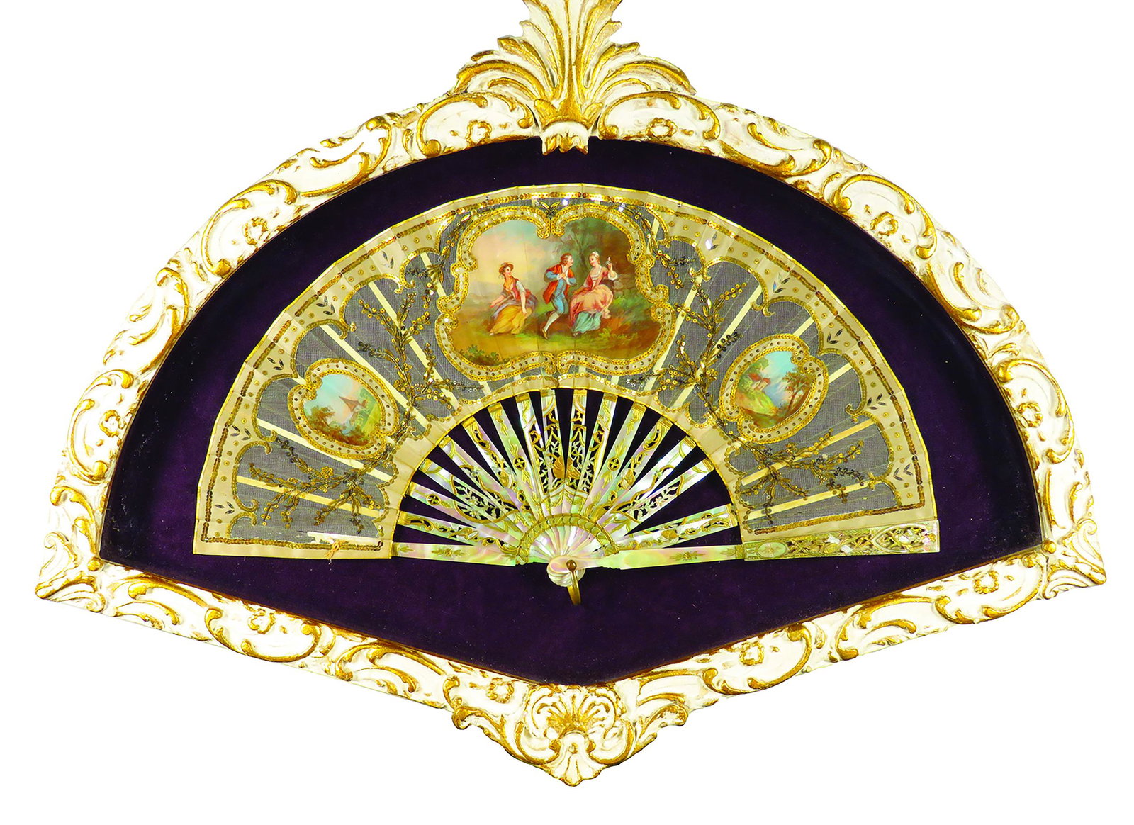 Antique Victorian Mother of Pearl Hand Fan: Antique Victorian, Mother of Pearl Hand Fan, ca. 1890. Hand carved mother of pearl with etched gold. Fine mesh with tiny gold sequined vine and pictorial cameos. Beautifully framed in shadow box. 22 1