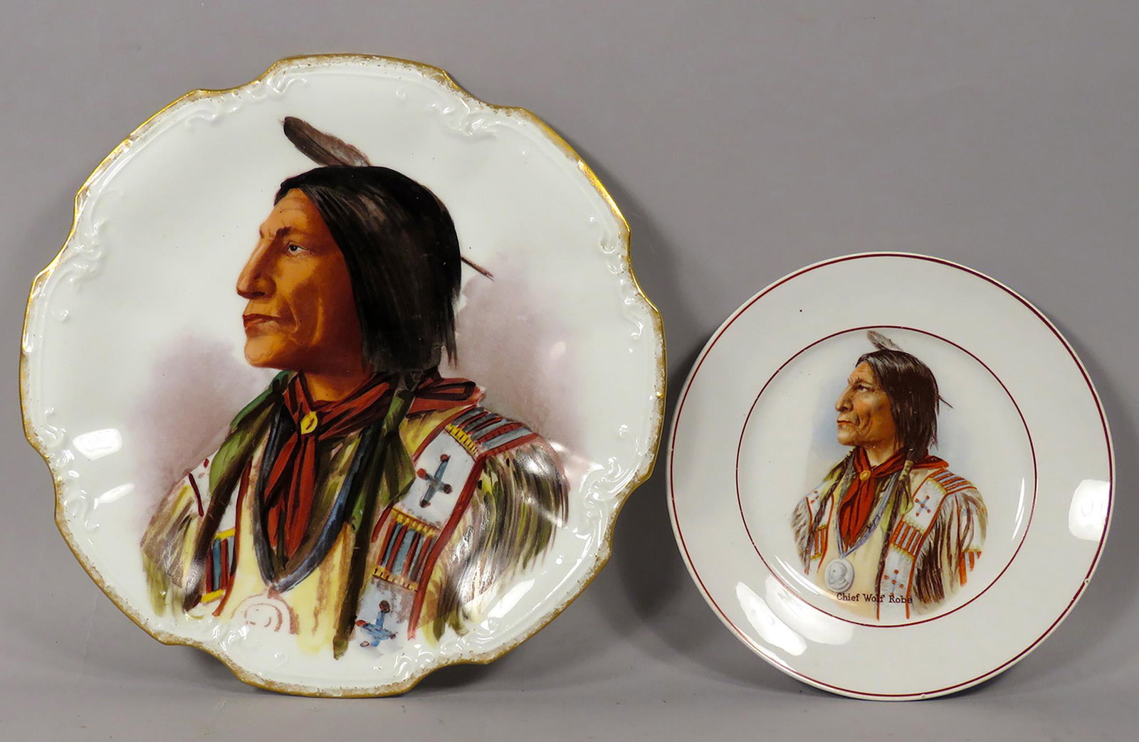 Native American Chief Wolf Robe Porcelain Plates: Native American Chief, Wolf Robe-Cheyenne Porcelain Plates. Large scalloped edge plate marked B & H Limoges France. Small plate marked Semi-porcelain with arrow. No chips or cracks. Large plate 8 3/4 