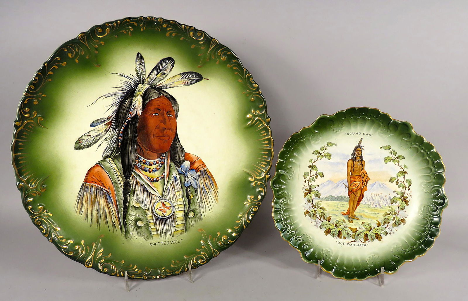 Two Native American Motif Plate and Charger: Two Native American Motif Plate and Charger. Round Oak Stoves advertising plate depicting Native "Doe-Wah-Jack", 9 inch diameter. Haynes-Balta Charger depicting "Spotted Wolf", 13 inch diameter. Norma