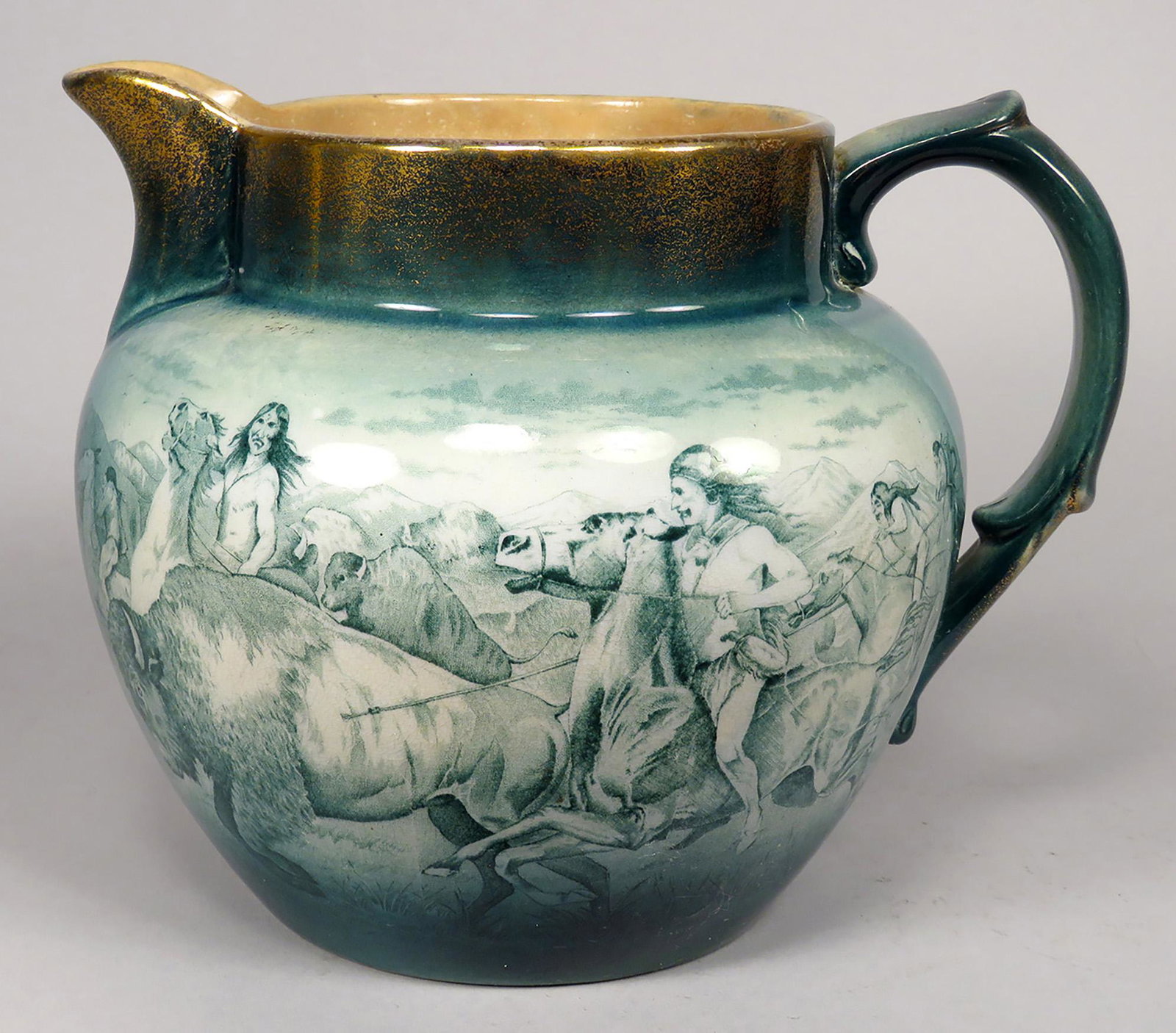 Buffalo Pottery "Buffalo Hunt" Pitcher: Buffalo Pottery "Buffalo Hunt" Pitcher. Normal crazing, no chips or cracks. 6 inches tall X 7 inch diameter.