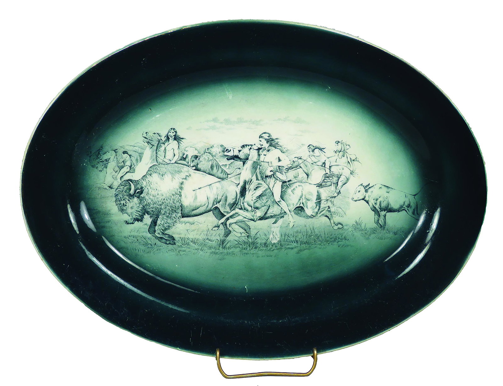 Buffalo Pottery "Buffalo Hunt" Oval Platter: Buffalo Pottery "Buffalo Hunt" Oval Platter. Tiny chip at 8:00 otherwise good condition. 15 X 11 inches.