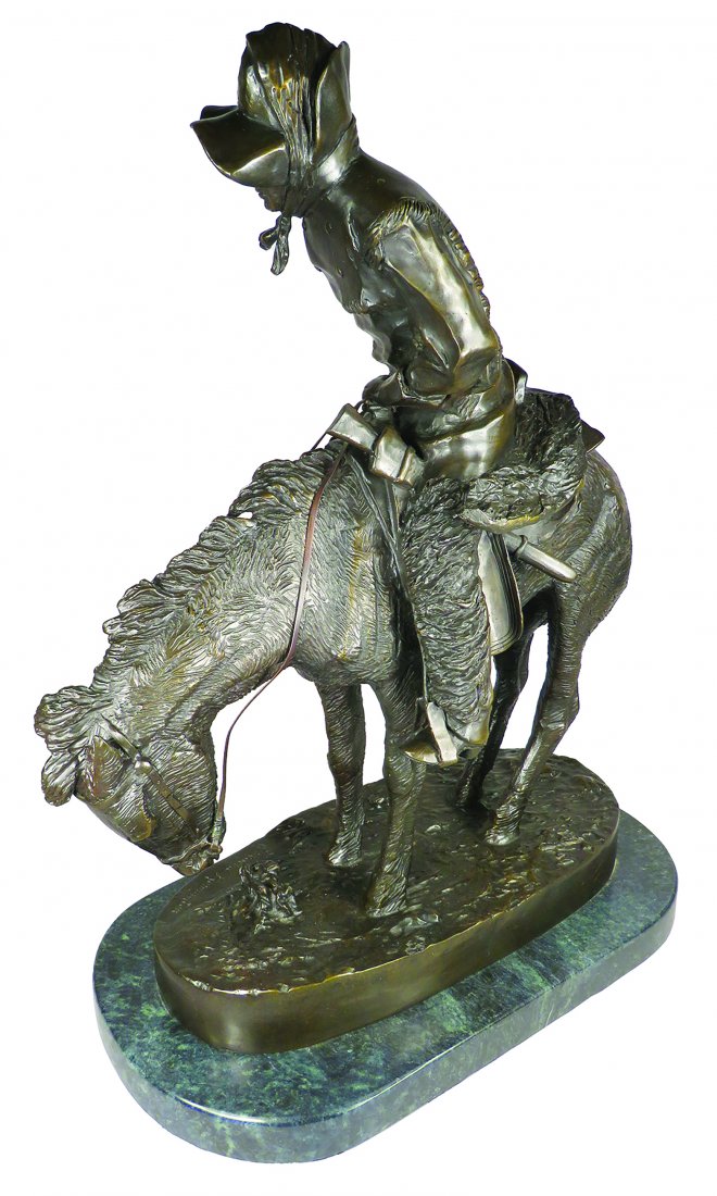 Frederic Remington "The Norther" Bronze: Frederic Remington (1861-1909) "The Norther" Bronze was described as a cowboy on horseback in a snow storm. Severe wind blowing from the rear. Both man and horse are almost frozen. This sculpture, dem