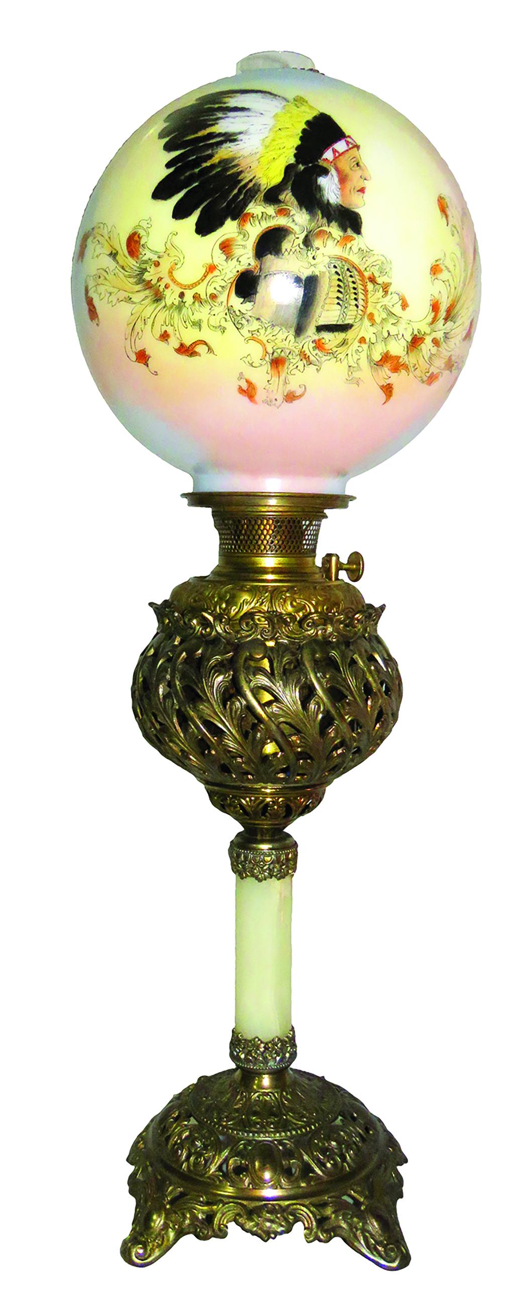 Antique Bradley Hubbard Oil Lamp: Antique Bradley Hubbard Oil Lamp. Hand painted with Native American Indian image, soft pastel background. Electrified working condition. 29 inches tall overall, 10 inch milk glass globe has rough edge