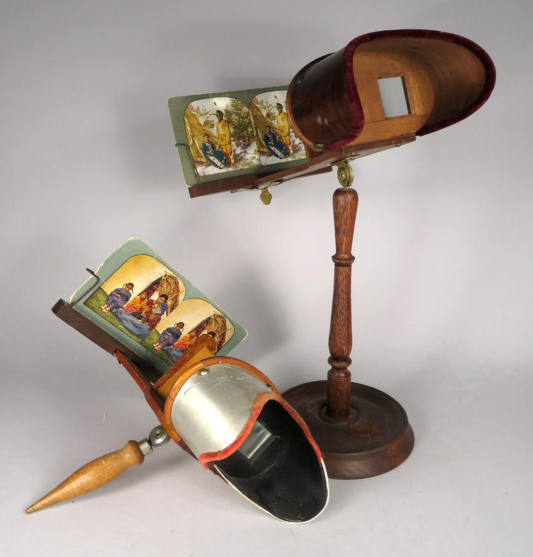Two Antique Stereo Card Viewers: Two, Antique Stereo Card Viewers. Hand held with etched tin, patented July 1903, card no. 424 Family Group of Sioux and Lodge. Table top model, card no. 409 Mazaicasuanin and his wife an Paohdinajin.