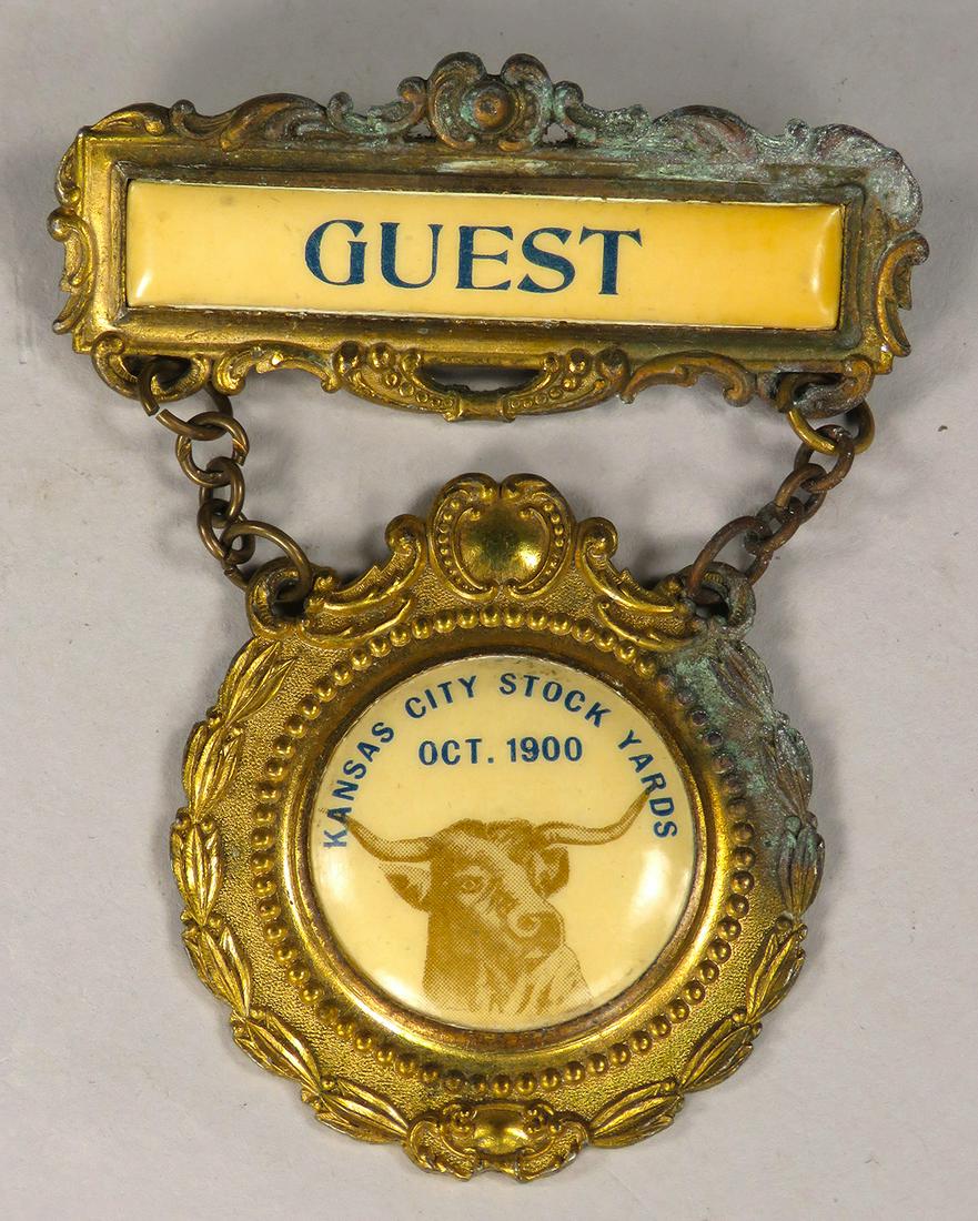 1900 Kansas City Stock Yards Guest Badge: 1900, Kansas City Stock Yards, Guest Badge. Two part badge with celluloid inlay. 3 inches tall.