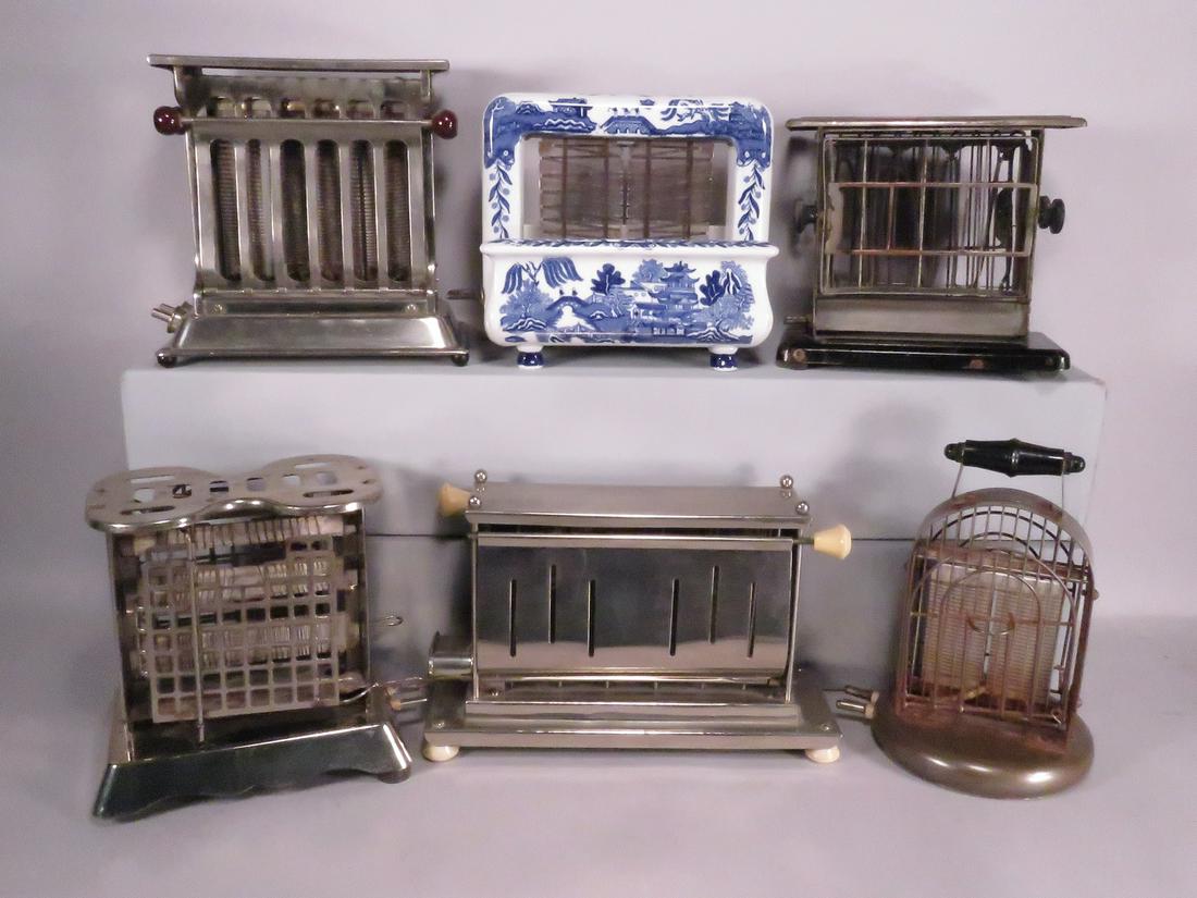Collection of 6 Vintage Toasters: Collection of 6 Vintage Toasters. From left to right, back to front. Marked as follows: Apel-Spark, brown Bakelite knobs. Rare Pan Electric Mfg. Co. Toastrite ca. late 20's-30's. Porcelain with Blue W