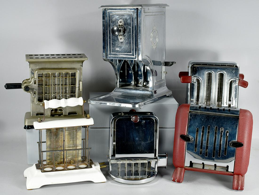 Collection of 6 Vintage Toasters: Collection of 6 Vintage Toasters. From left to right, back to front. Marked as follows: No maker, white porcelain base and handle. Reactor chrome with Bakelite knobs. Clem-Southbend-England, burgundy 