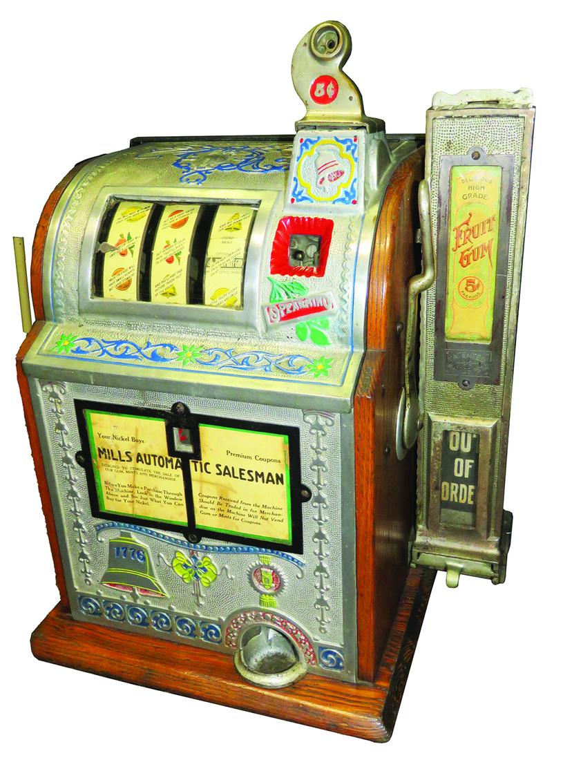 5 Cent Mills Automatic Salesman, Slot Machine: Coin Operated, 5 Cent Mills Automatic Salesman-OK Vendor with a Jennings coin neck. 3 reel slot machine with fruit gum side vendor. Original label on case. The back is a reproduction. Very good origin