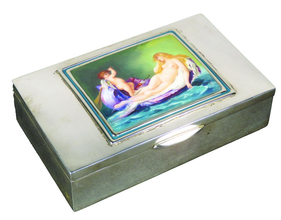 Antique Sterling Silver and Enamel Cigar Box: Antique Sterling Silver and Enamel Cigar Box. Depicting reclining nude and cherub on shell raft. Crown hallmark on bottom. 6 1/8 X 1 1/2 X 3 1/2 inches. Cigars not include.