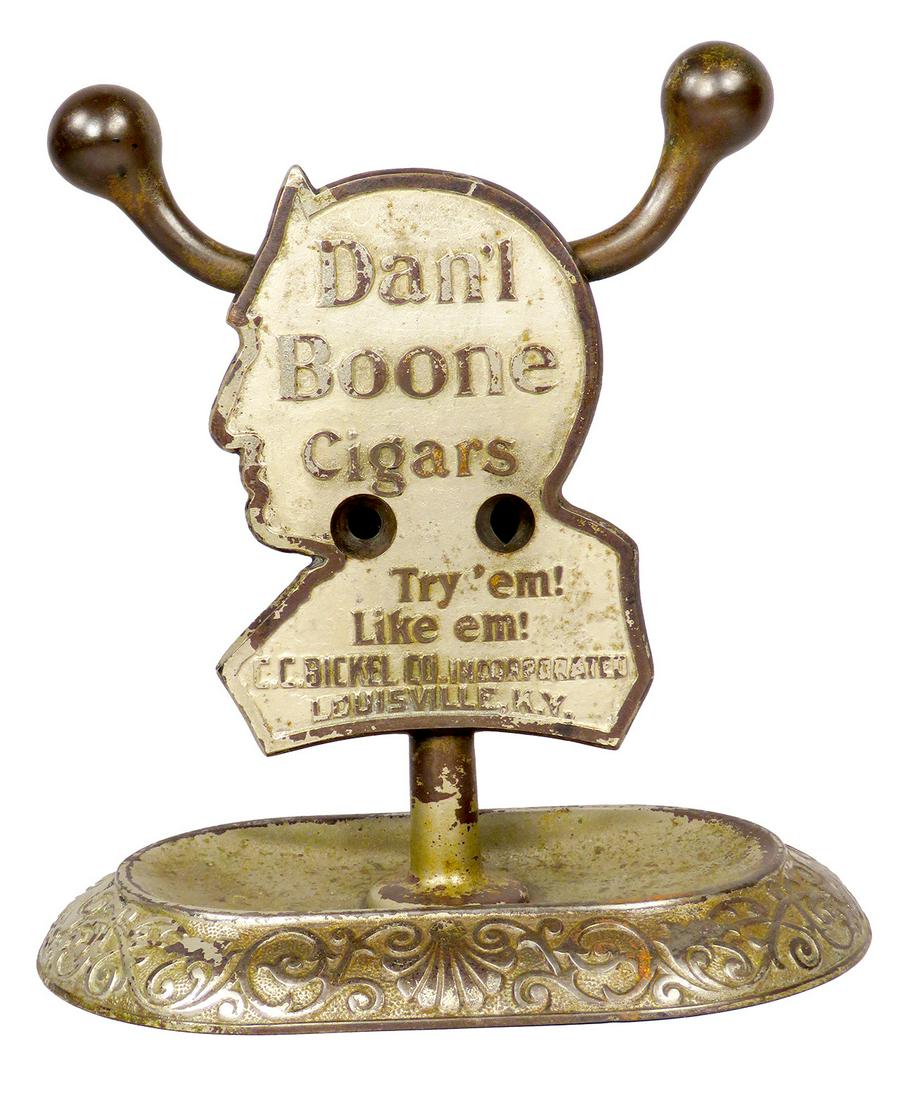 Daniel Boone Cigars Tip Cutter: Dan'l Boone Cigars, Tip Cutter. Daniel Boone. Made by Advertising Specialties, The Brunhoff Mfg. Co. Nickel plated cast iron. Nickel worn otherwise good condition. We have never seen another one of th