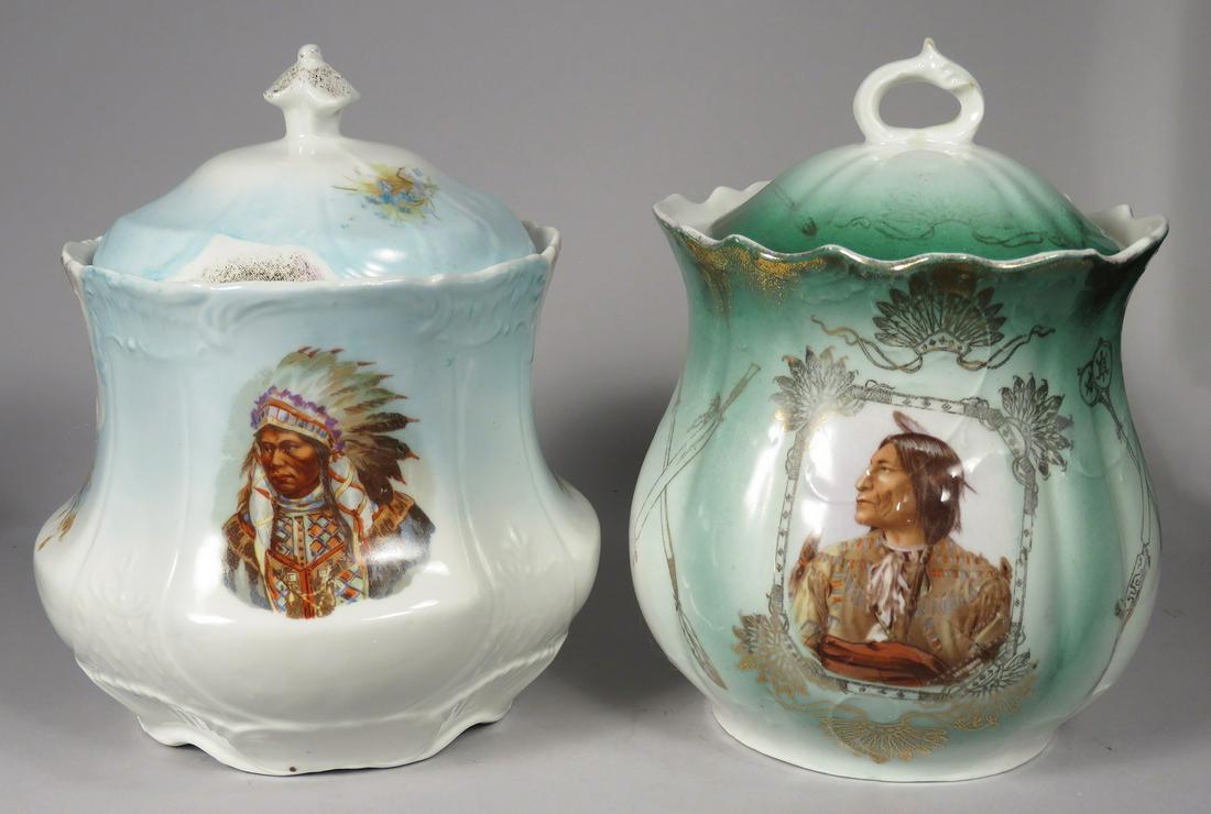 Two Antique Biscuit Jars: Two Antique Biscuit Jars with Native American Motif. Green tone marked Royal Saxe Germany. No chips or cracks. 7 1/4 inches tall X 5 1/2 inch diameter.