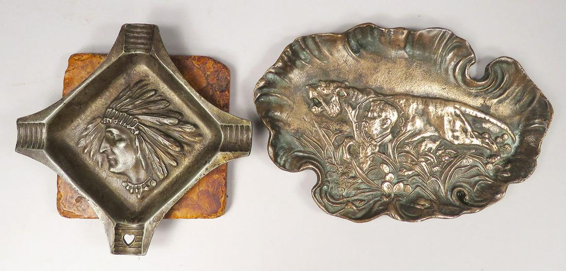 Two Vintage Embossed Ashtrays: Two Vintage Embossed Ashtrays. Native American Indian image mounted on a tile, 5 1/4 X 5 1/2 inches. Copper flashed tray with image of Roosevelt and tiger. 7 1/2 X 5 inches.